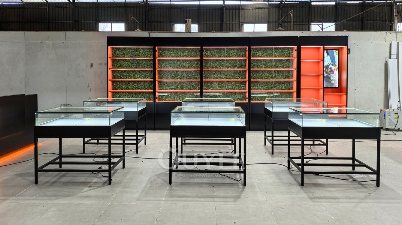 Black Metal Island Display Cabinet Set with Orange Accent Wall 01