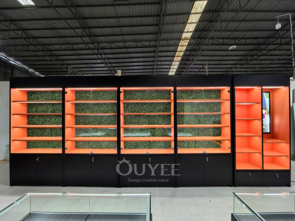 Black Metal Island Display Cabinet Set with Orange Accent Wall 03