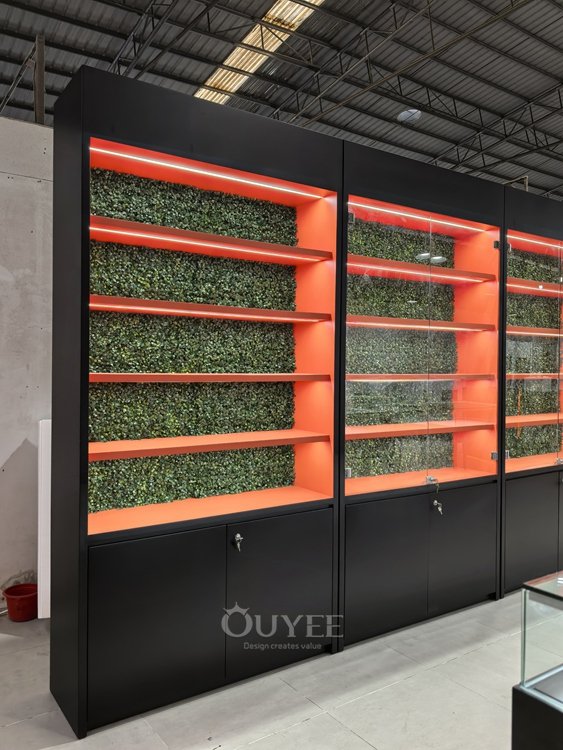 Black Metal Island Display Cabinet Set with Orange Accent Wall 06