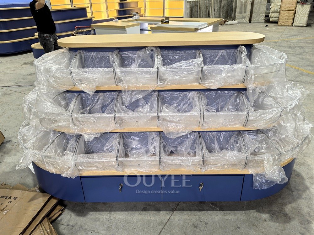 Blue Tiered Island Display Stand with Curved Shelves 01