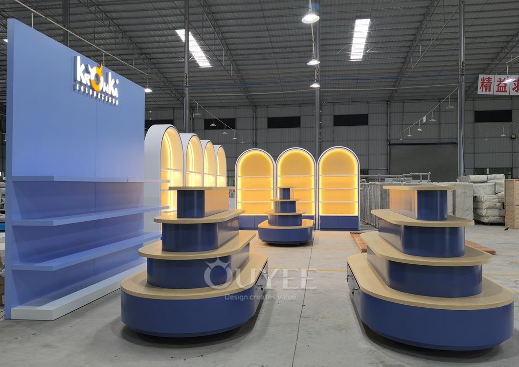 Blue Tiered Island Display Stand with Curved Shelves 04