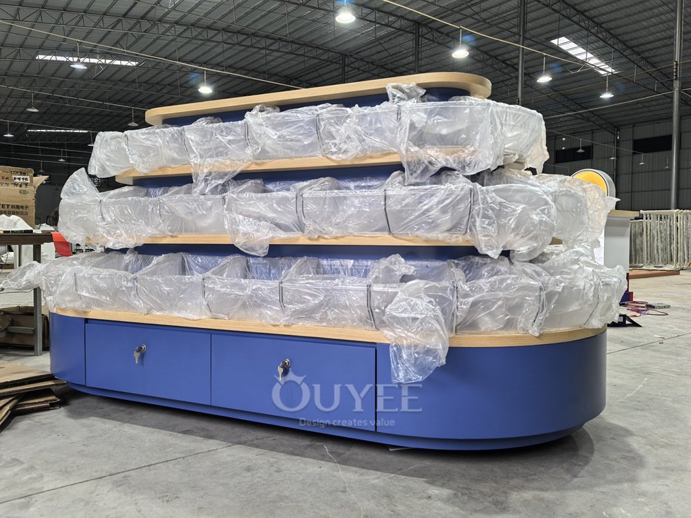 Blue Tiered Island Display Stand with Curved Shelves 07