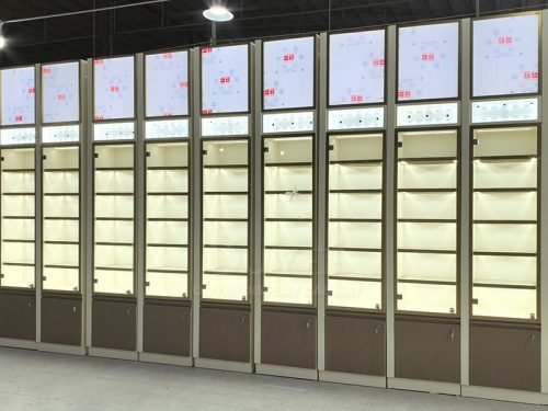 Full Height Illuminated Display Cabinet Wall with Header Panels 01