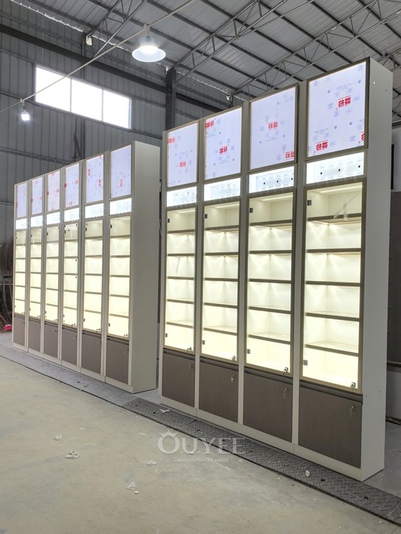 Full Height Illuminated Display Cabinet Wall with Header Panels 03