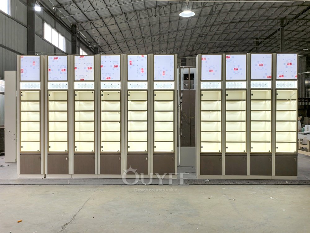 Full Height Illuminated Display Cabinet Wall with Header Panels 05