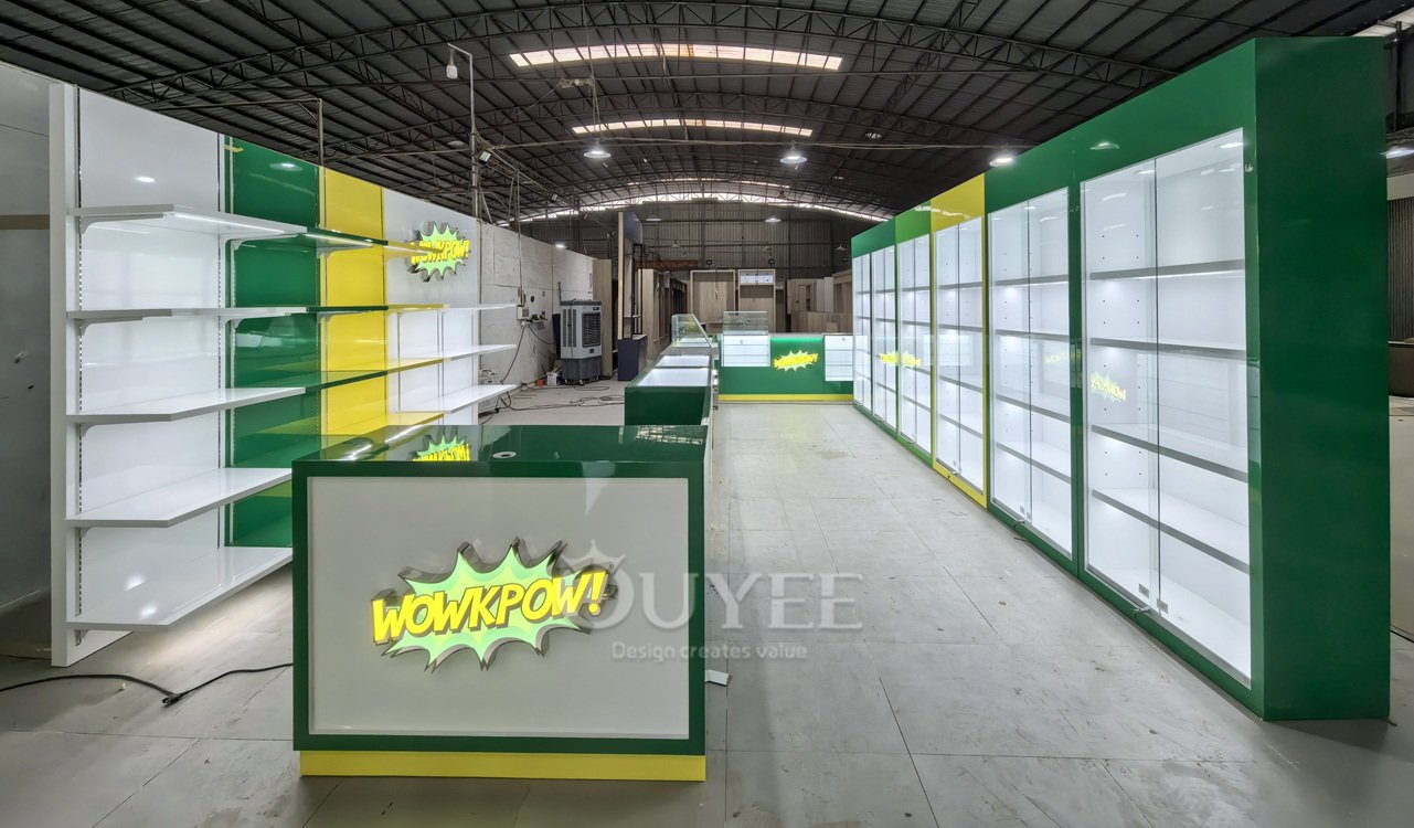 Green and White Retail Display Cabinet with Service Counter 01