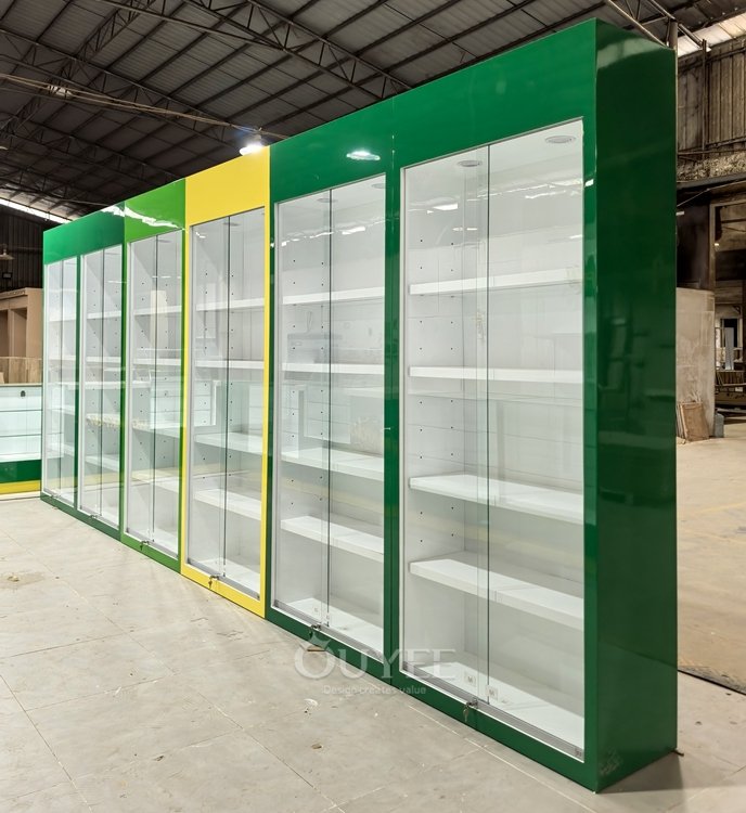 Green and White Retail Display Cabinet with Service Counter 06