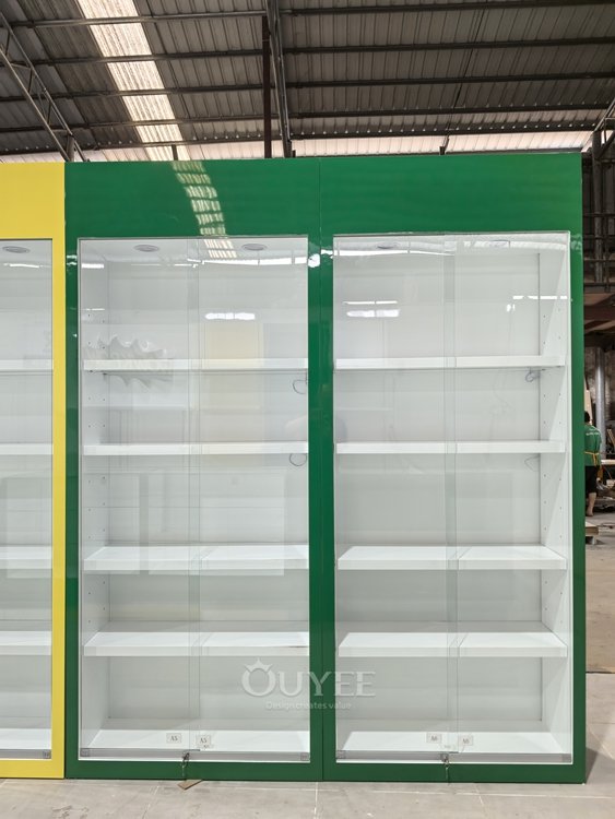 Green and White Retail Display Cabinet with Service Counter 07