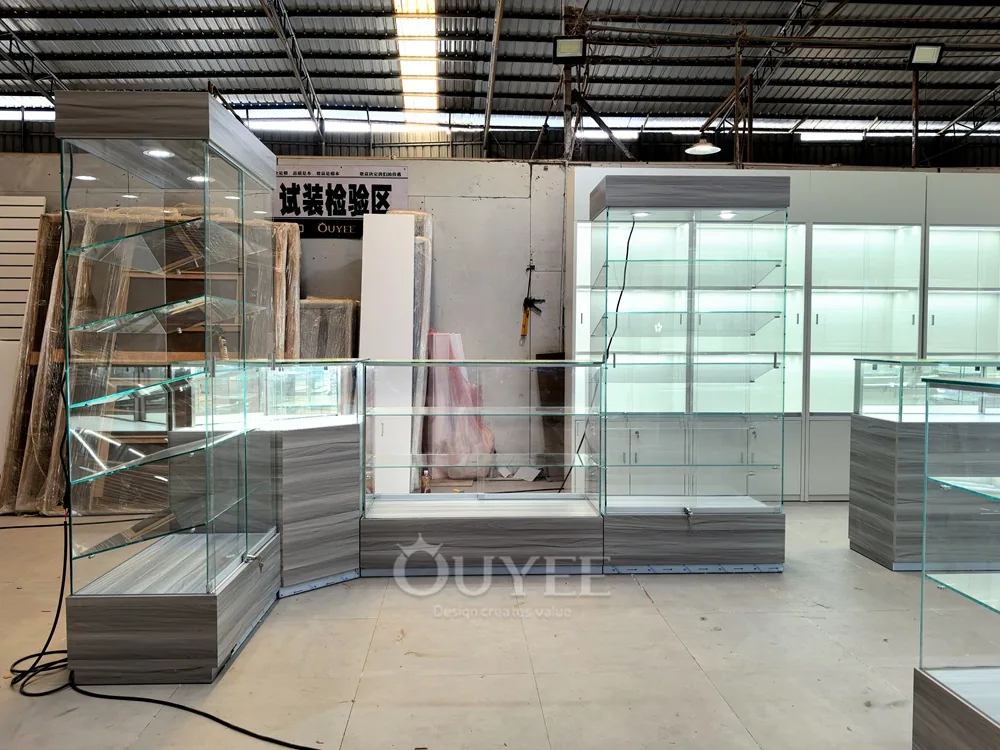 Long Gray Jewelry Showcase Counter with Marble Branding Wall 02