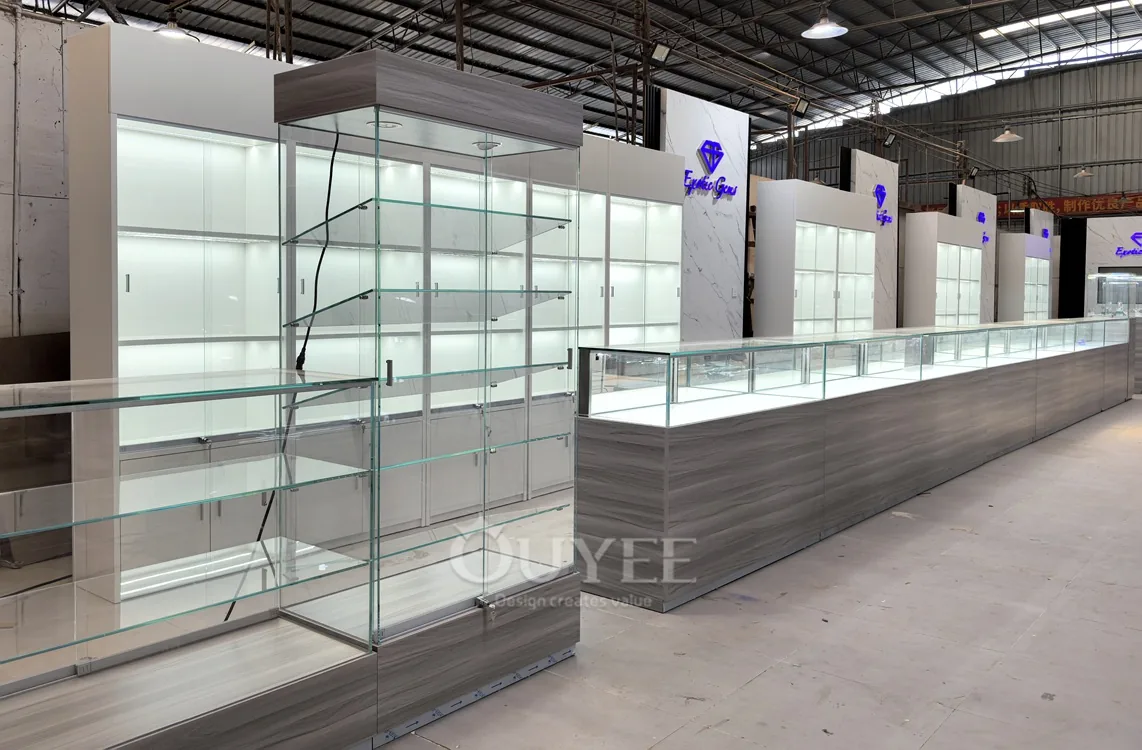 Long Gray Jewelry Showcase Counter with Marble Branding Wall 03