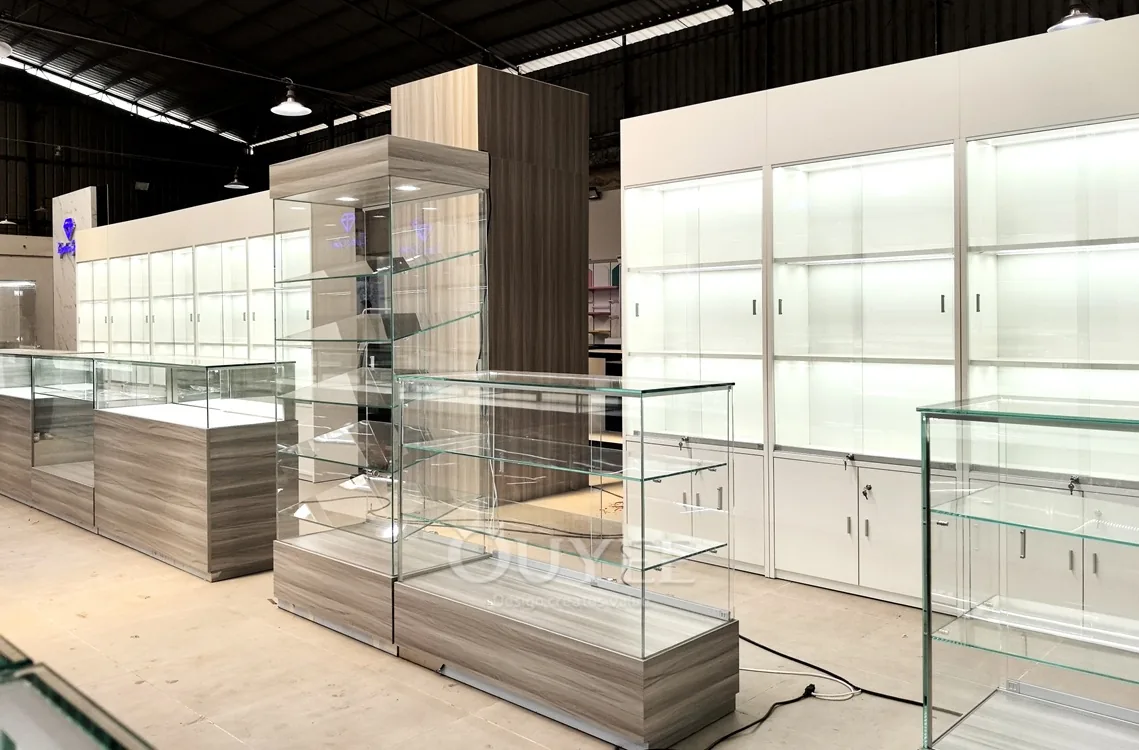 Long Gray Jewelry Showcase Counter with Marble Branding Wall 06