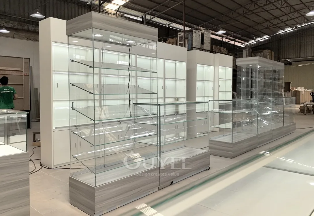 Long Gray Jewelry Showcase Counter with Marble Branding Wall 07