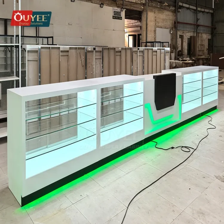 Long White Glass Showcase Counter with Green LED Kicklight | Custom ...