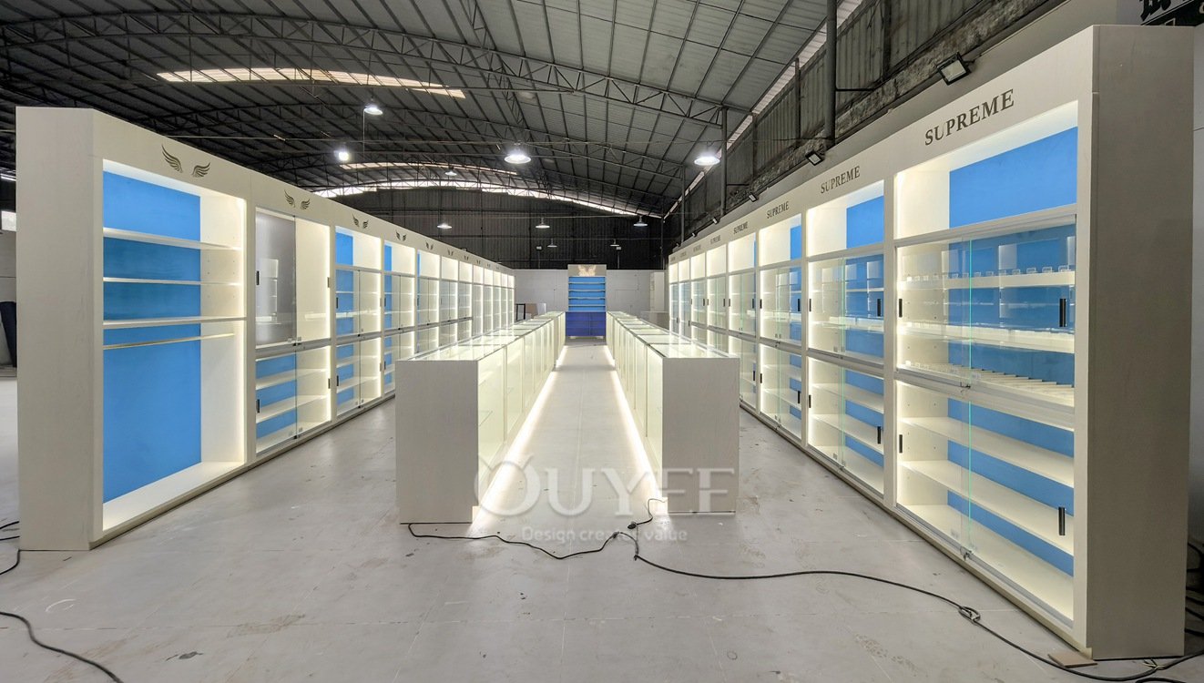 White Backlit Display Cabinet Wall with Blue Panels 02