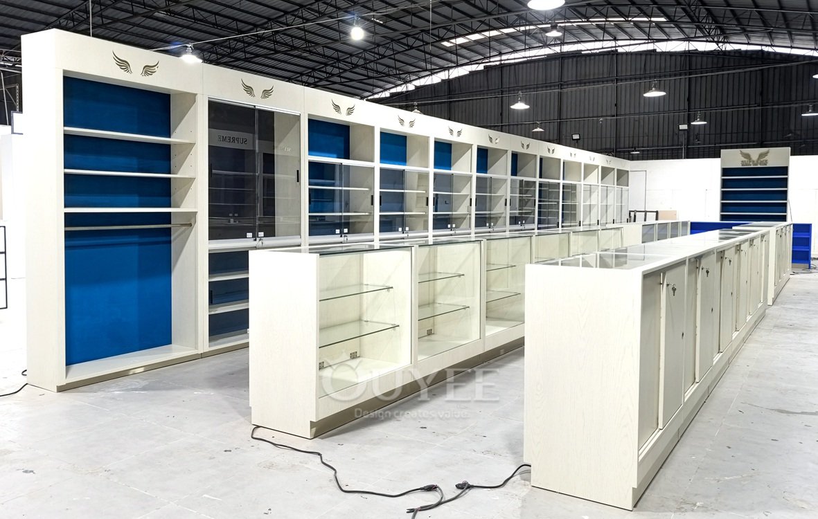 White Backlit Display Cabinet Wall with Blue Panels 06