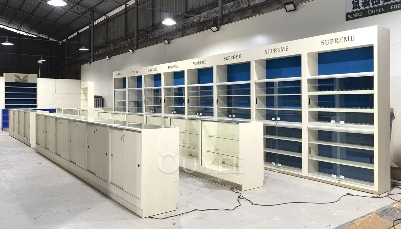 White Backlit Display Cabinet Wall with Blue Panels 07