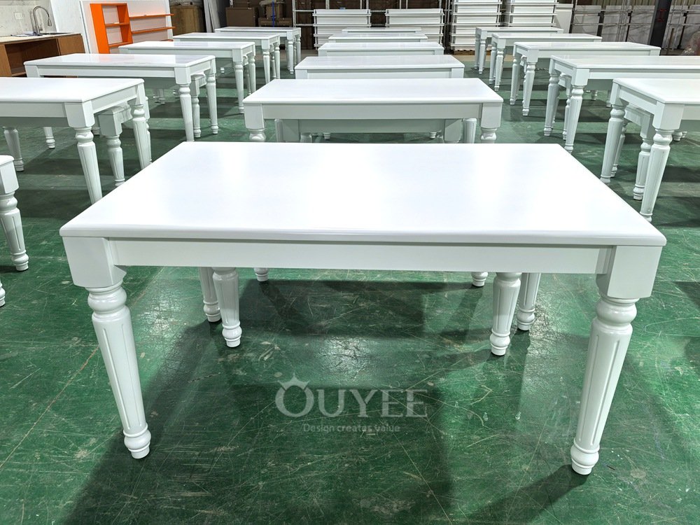 White Classic Retail Display Table with Turned Legs 01
