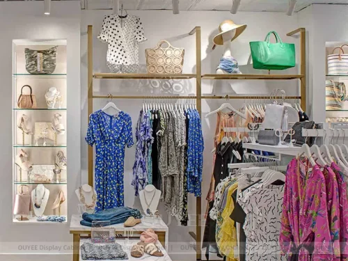 Gold Boutique Apparel Wall Rails with Marble Table 01