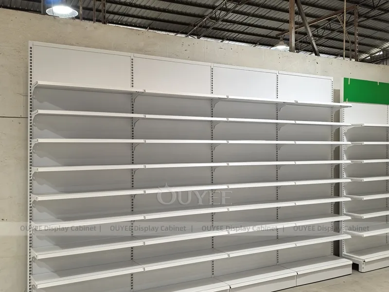 Long White Pharmacy Wall Green Shelving Display