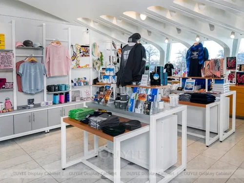 White Boutique Apparel Tables with Perimeter Cabinets 01