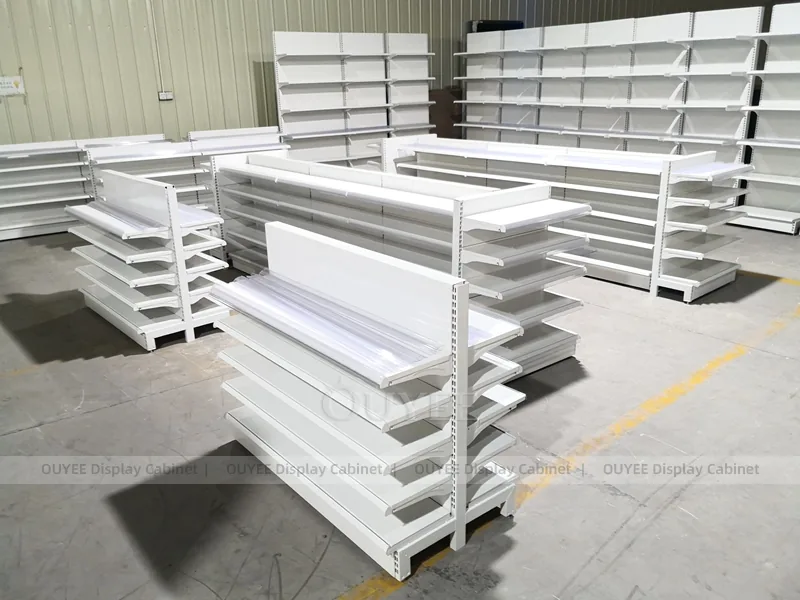 White Pharmacy Wall Shelving With Green Accent - Image 3